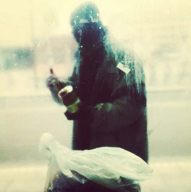 This french artist captures people waiting at bus stops