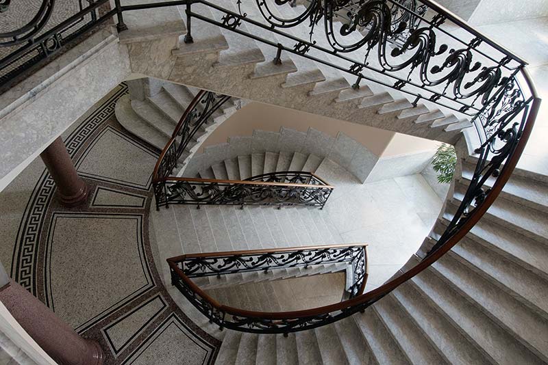 Sculptural staircase brings old and new together in historic Brussels building
