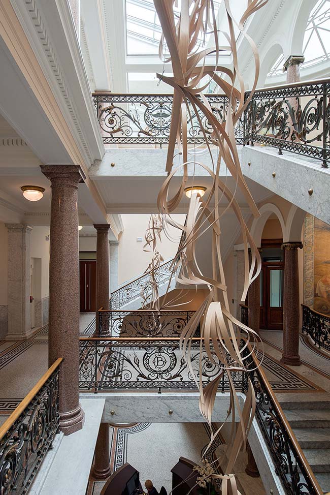 Sculptural staircase brings old and new together in historic Brussels building
