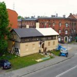 Artist Ian Strange covers historical building in over 600 sq metres of gold wallpaper