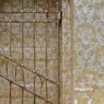 Artist Ian Strange covers historical building in over 600 sq metres of gold wallpaper