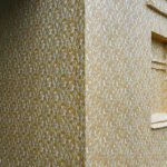 Artist Ian Strange covers historical building in over 600 sq metres of gold wallpaper