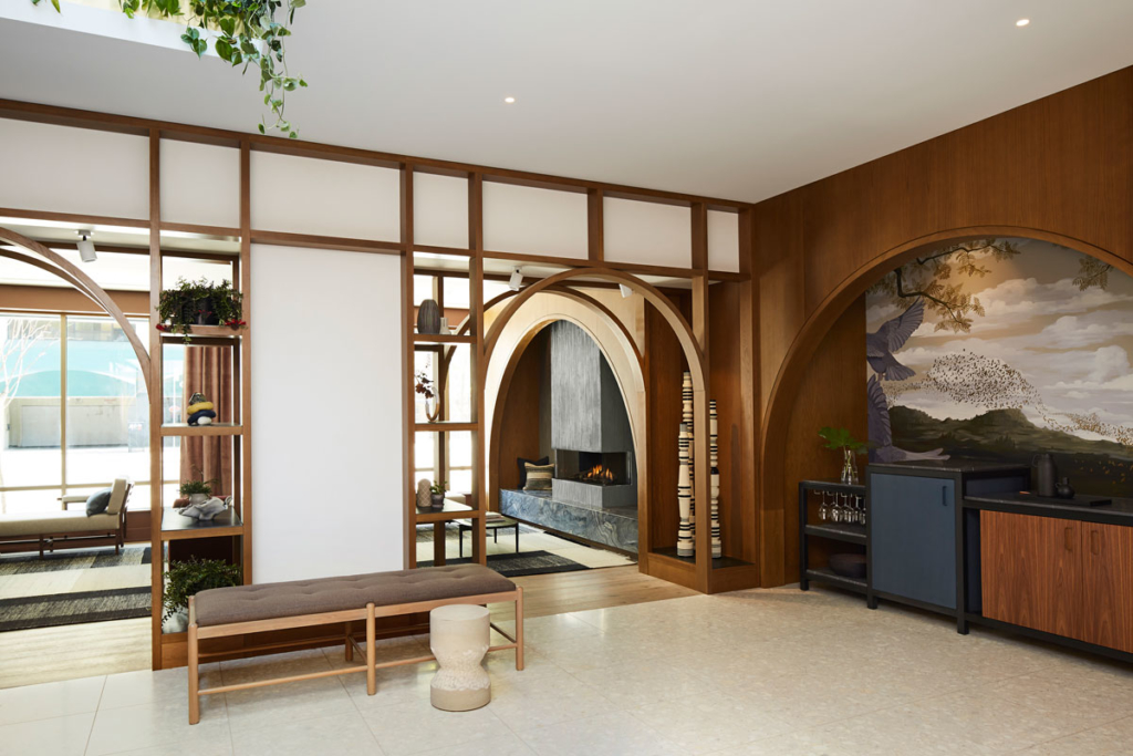 Hotel lobby reception with Kimpton wine hour bar table.