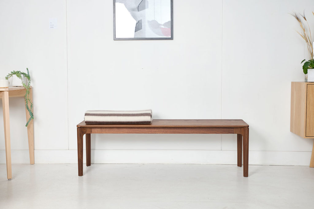 C112 bench shown in American Black Walnut