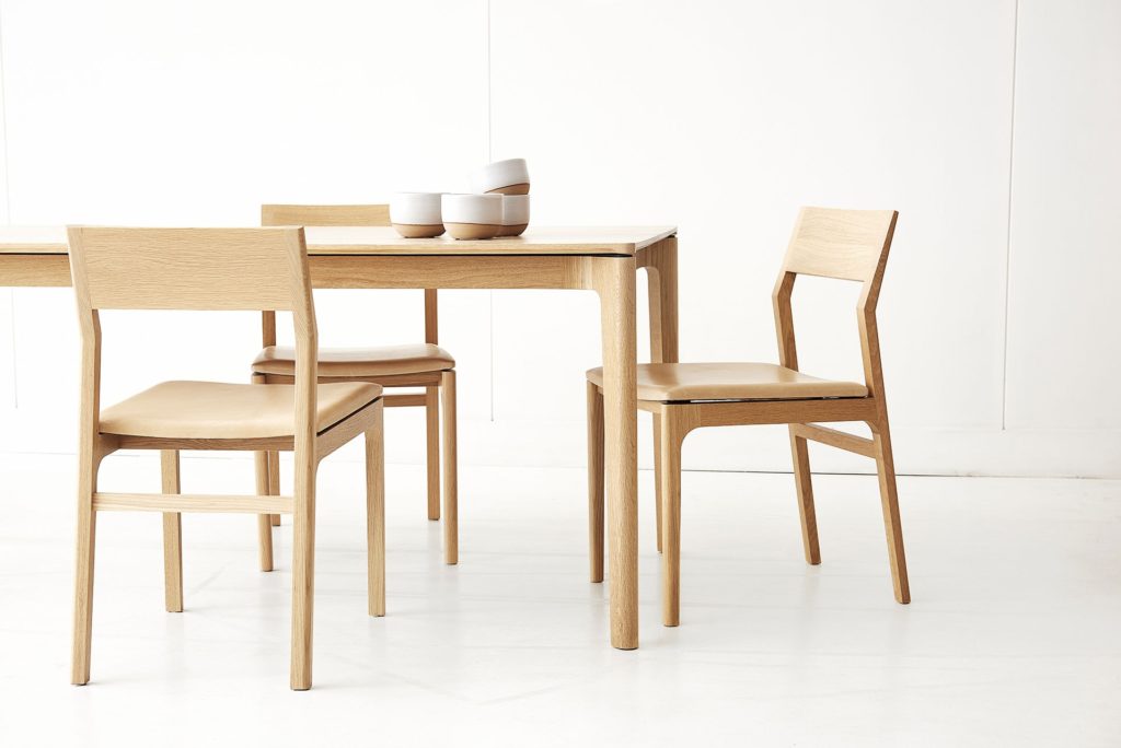 T113 table & C205 chairs shown in American White Oak