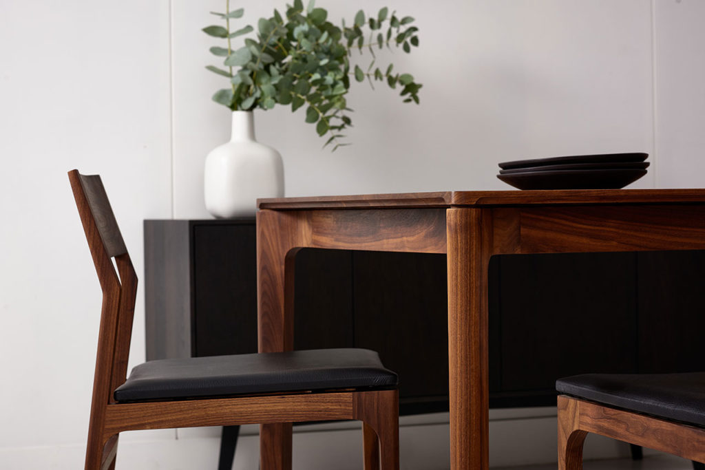 T113 table & C205 chairs shown in American Black Walnut
