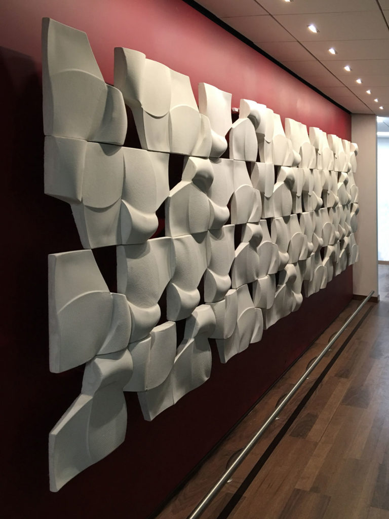 Chaos and order, concrete sculpture