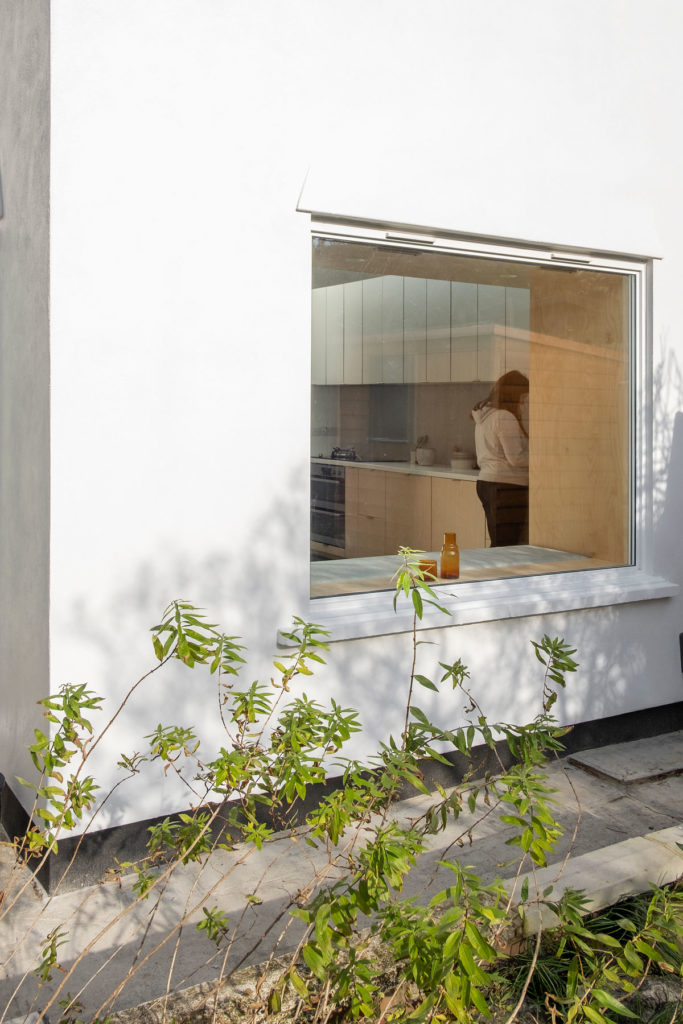 The Nook House - a window seat and subterranean wine cellar extension to a family home in London