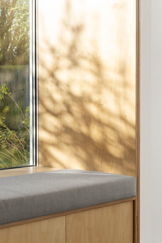 The Nook House - a window seat and subterranean wine cellar extension to a family home in London