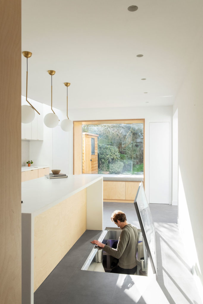 The Nook House - a window seat and subterranean wine cellar extension to a family home in London