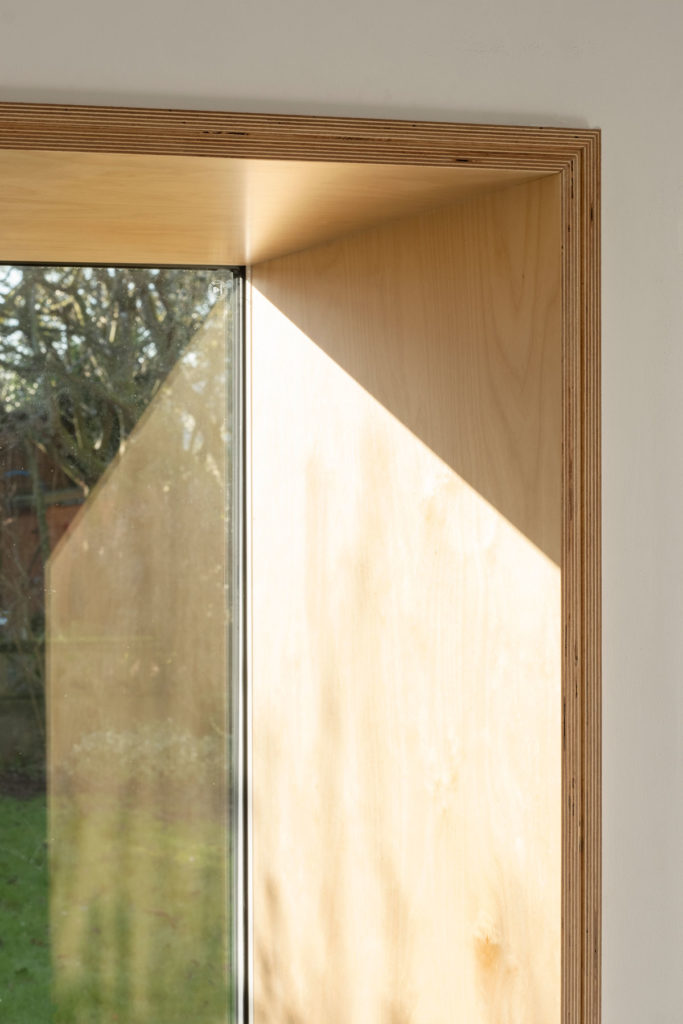 The Nook House - a window seat and subterranean wine cellar extension to a family home in London