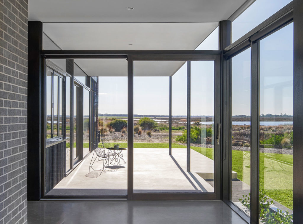 Torquay Beach House, a new contemporary home  celebrating raw concrete and exposed brick