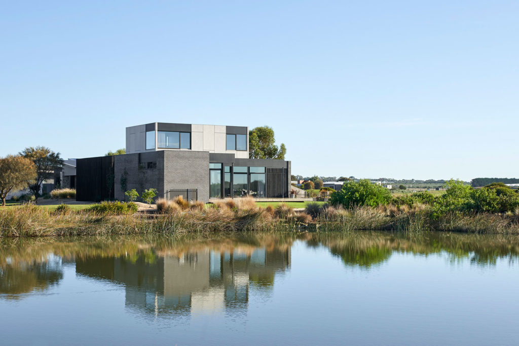 Torquay Beach House, a new contemporary home  celebrating raw concrete and exposed brick