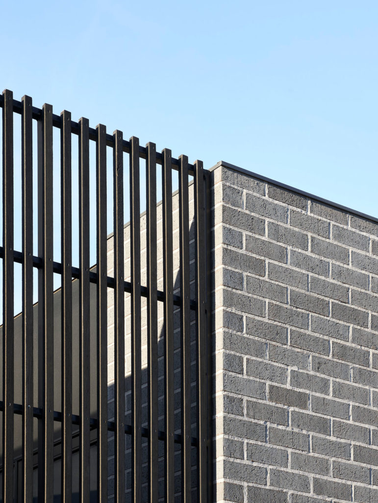 Torquay Beach House, a new contemporary home  celebrating raw concrete and exposed brick