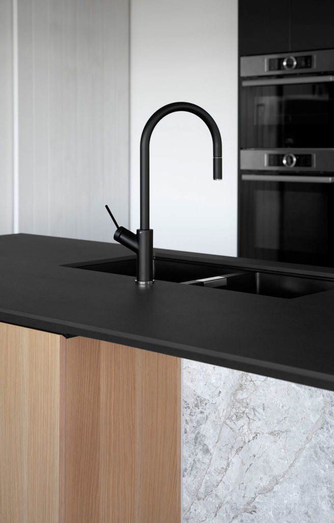 Torquay Beach House, a new contemporary home  celebrating raw concrete and exposed brick