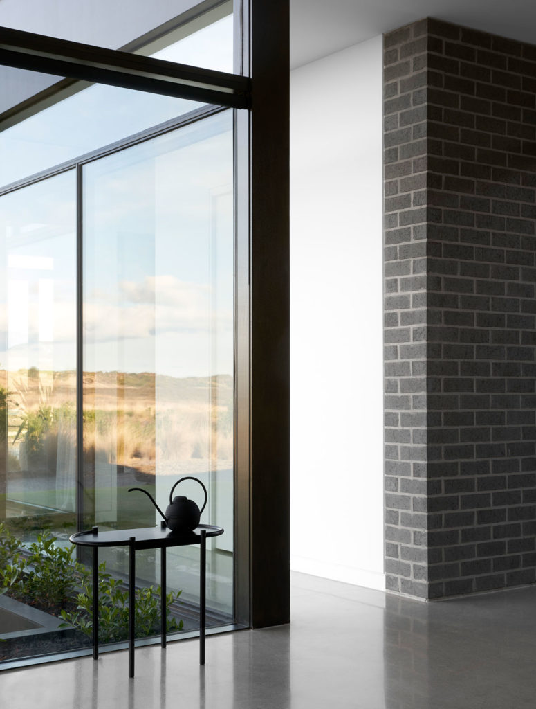 Torquay Beach House, a new contemporary home  celebrating raw concrete and exposed brick