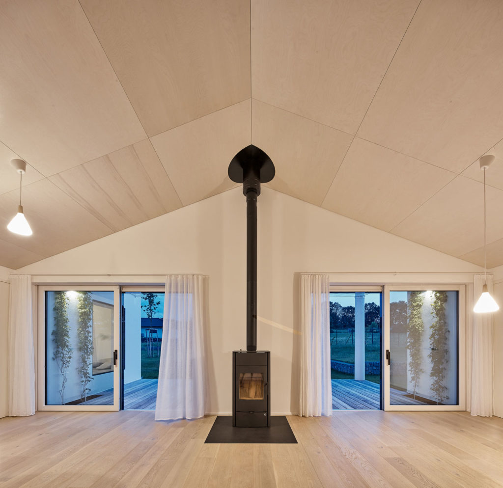 House in a field by DDAANN