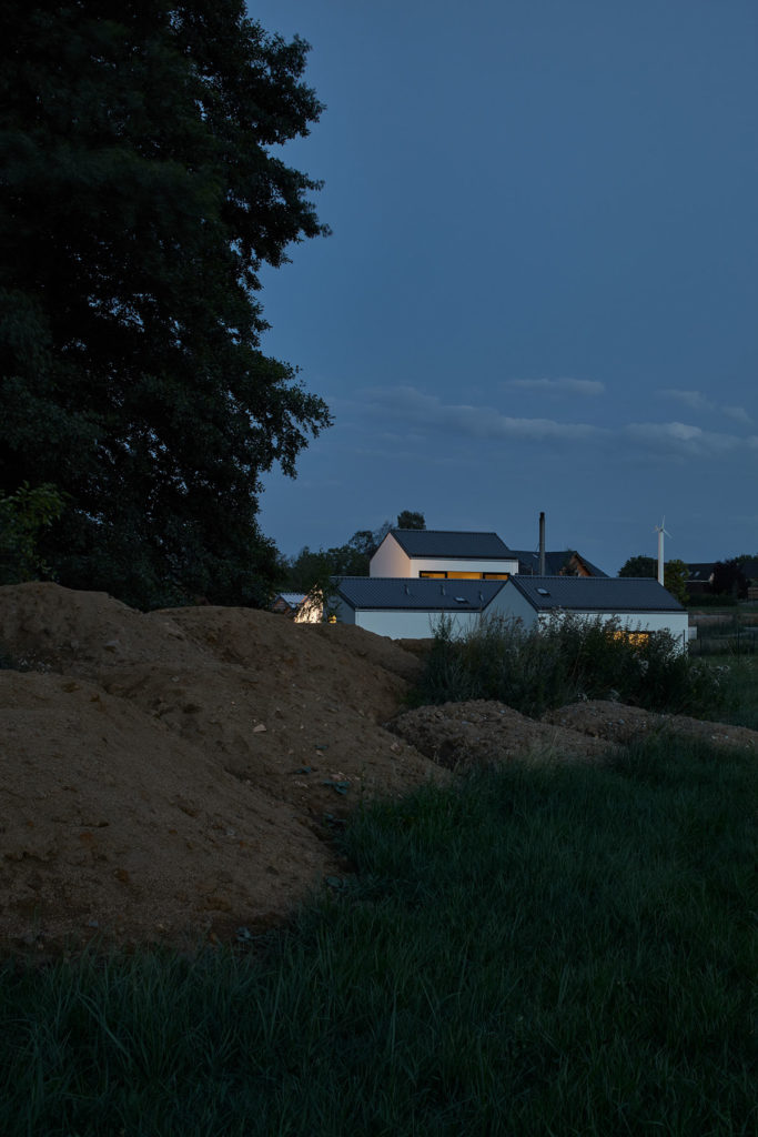 House in a field by DDAANN