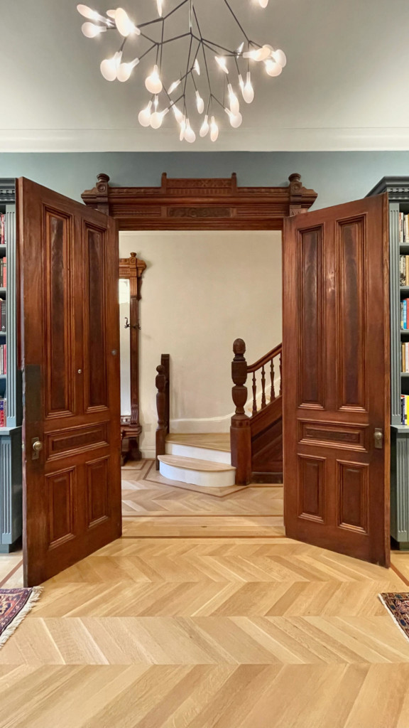 Library to entrance hall - Historic Harlem House Modern Restoration by MESH Architectures