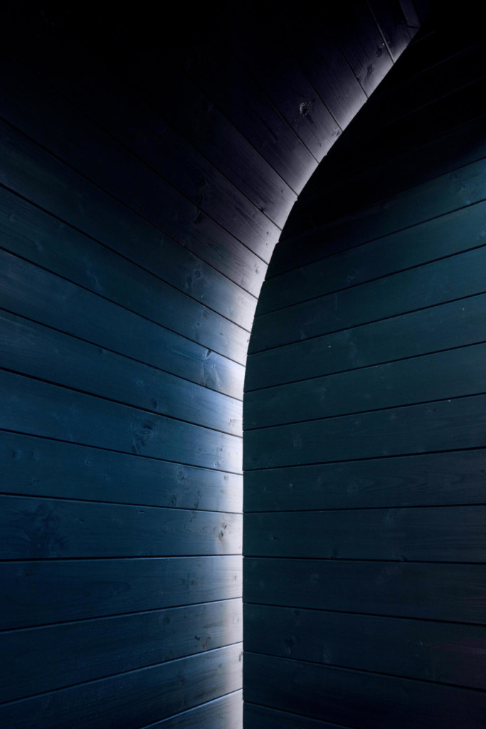 Light seeps in through the crevices, and the sea breeze blows in through them