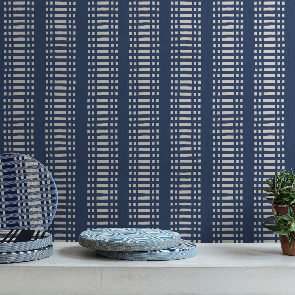 Nereus wallpaper in Dark Blue, shown with Johanna Gullichsen disc cushions from the Normandie collection