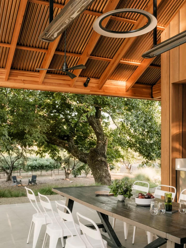 The exposed framing and steel moment frame the space in an orderly and logical way. Corrugated polycarbonate skylights at the barn ridge ensure the space is well-lit all day.