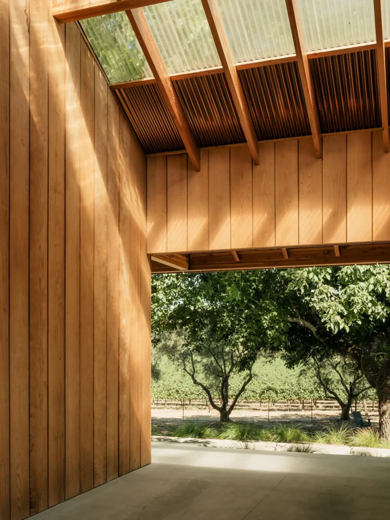 Using local materials and traditional designs, the barn addition blends effortlessly with its surroundings, feeling like a natural part of the landscape.
